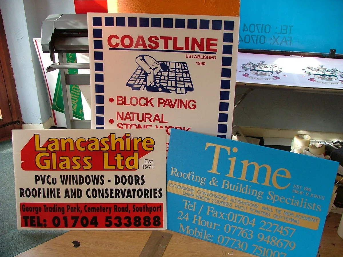 Selection of printed trade and contractor signs