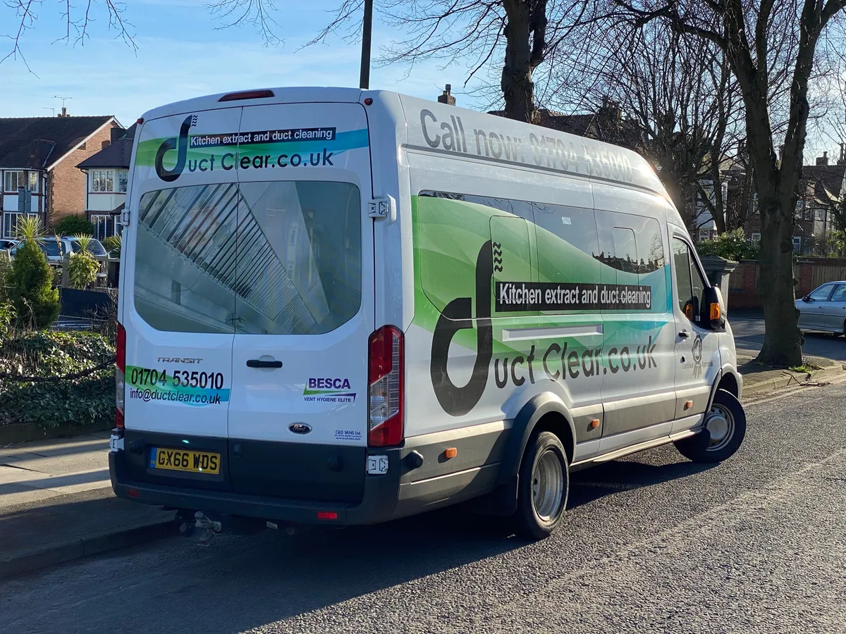 Printed van wrap with rear-window graphics